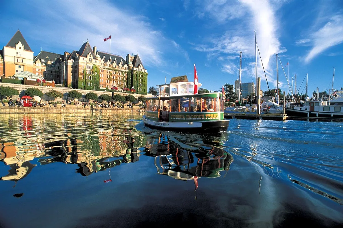 Victoria Harbour Ferry crossing the Inner Harbour with the Fairmont Empress Hotel in the background